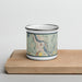Front View Custom Bellows Falls Vermont Map Enamel Mug in Woodblock on Cutting Board