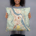 Person holding 18x18 Custom Bellows Falls Vermont Map Throw Pillow in Woodblock