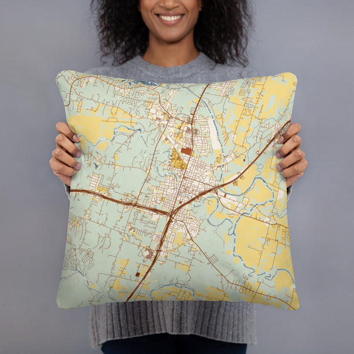 Person holding 18x18 Custom Belton Texas Map Throw Pillow in Woodblock