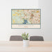 24x36 Benbrook Texas Map Print Lanscape Orientation in Woodblock Style Behind 2 Chairs Table and Potted Plant