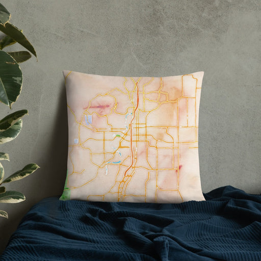 Custom Bend Oregon Map Throw Pillow in Watercolor on Bedding Against Wall