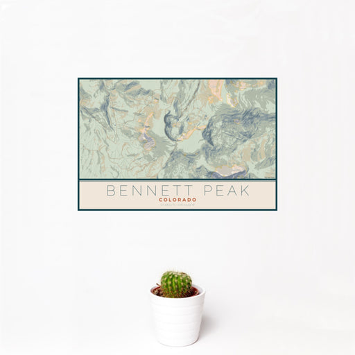 12x18 Bennett Peak Colorado Map Print Landscape Orientation in Woodblock Style With Small Cactus Plant in White Planter
