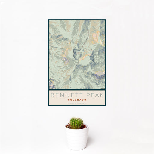 12x18 Bennett Peak Colorado Map Print Portrait Orientation in Woodblock Style With Small Cactus Plant in White Planter