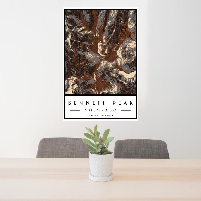 24x36 Bennett Peak Colorado Map Print Portrait Orientation in Ember Style Behind 2 Chairs Table and Potted Plant