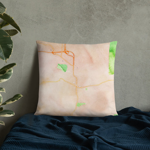Custom Bennington Vermont Map Throw Pillow in Watercolor on Bedding Against Wall