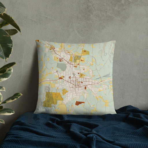 Custom Bennington Vermont Map Throw Pillow in Woodblock on Bedding Against Wall