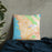 Custom Berkeley California Map Throw Pillow in Watercolor on Bedding Against Wall