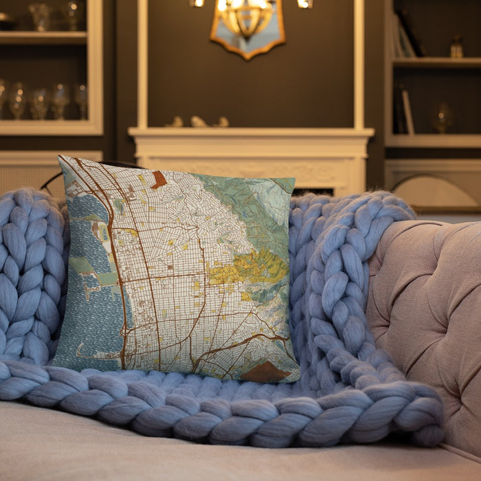 Custom Berkeley California Map Throw Pillow in Woodblock on Cream Colored Couch