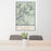 24x36 Big Bend National Park Map Print Portrait Orientation in Woodblock Style Behind 2 Chairs Table and Potted Plant