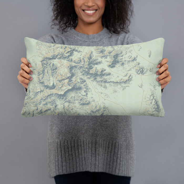 Person holding 20x12 Custom Big Bend National Park Map Throw Pillow in Woodblock
