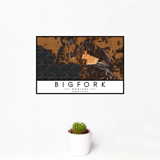 12x18 Bigfork Montana Map Print Landscape Orientation in Ember Style With Small Cactus Plant in White Planter