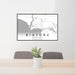 24x36 Bigfork Montana Map Print Lanscape Orientation in Classic Style Behind 2 Chairs Table and Potted Plant