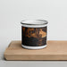 Front View Custom Bigfork Montana Map Enamel Mug in Ember on Cutting Board