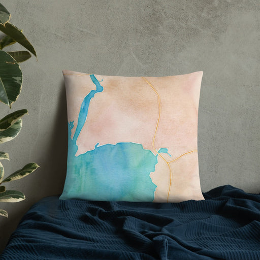 Custom Bigfork Montana Map Throw Pillow in Watercolor on Bedding Against Wall