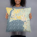 Person holding 18x18 Custom Bigfork Montana Map Throw Pillow in Woodblock