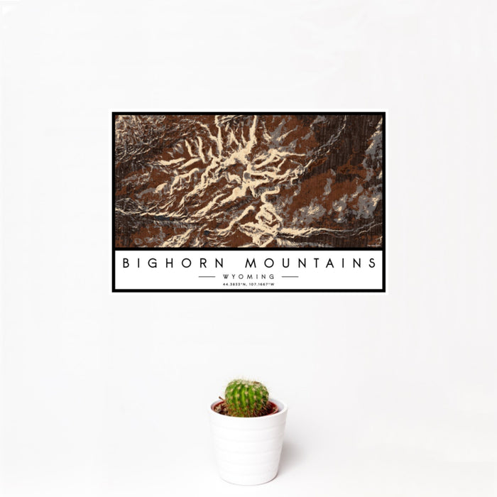 12x18 Bighorn Mountains Wyoming Map Print Landscape Orientation in Ember Style With Small Cactus Plant in White Planter
