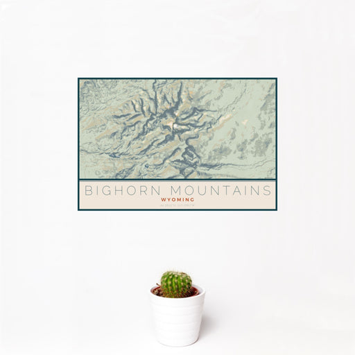 12x18 Bighorn Mountains Wyoming Map Print Landscape Orientation in Woodblock Style With Small Cactus Plant in White Planter