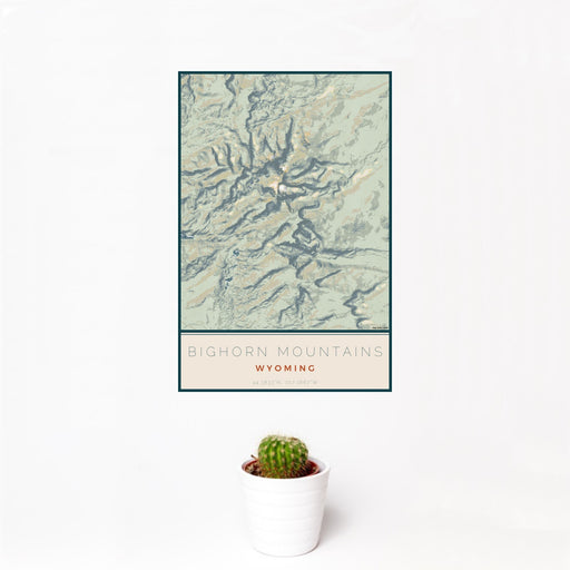 12x18 Bighorn Mountains Wyoming Map Print Portrait Orientation in Woodblock Style With Small Cactus Plant in White Planter