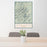 24x36 Bighorn Mountains Wyoming Map Print Portrait Orientation in Woodblock Style Behind 2 Chairs Table and Potted Plant