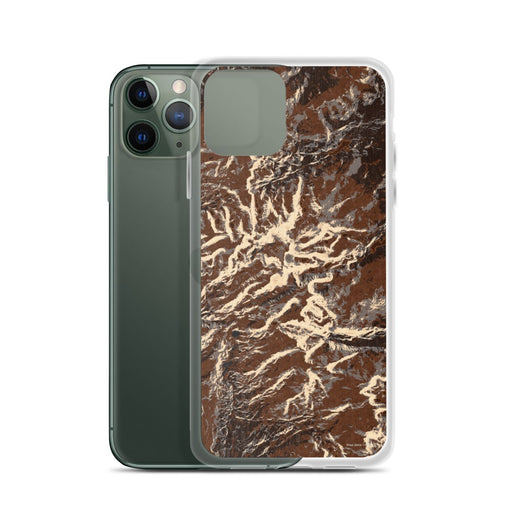 Custom Bighorn Mountains Wyoming Map Phone Case in Ember on Table with Laptop and Plant