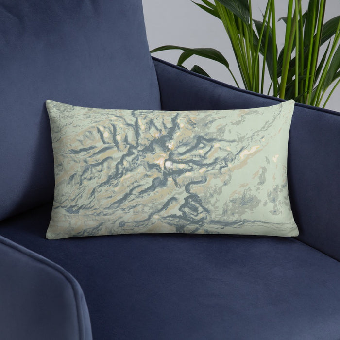 Custom Bighorn Mountains Wyoming Map Throw Pillow in Woodblock on Blue Colored Chair