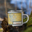 Right View Custom Big Lake Missouri Map Enamel Mug in Woodblock on Grass With Trees in Background