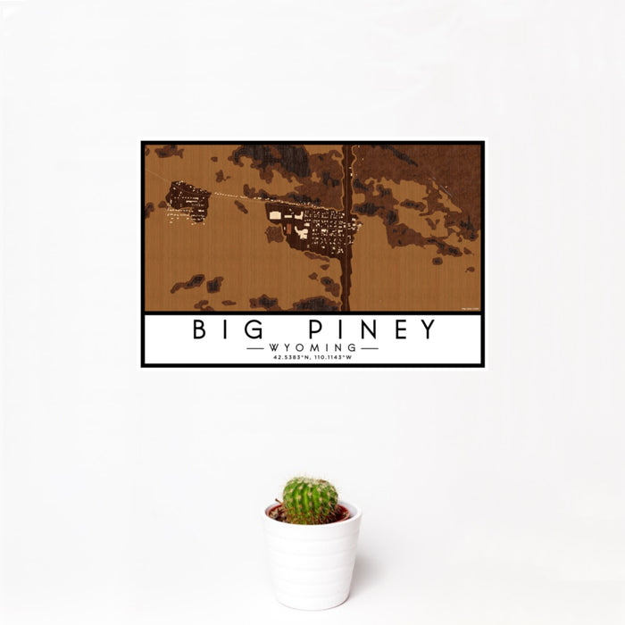 12x18 Big Piney Wyoming Map Print Landscape Orientation in Ember Style With Small Cactus Plant in White Planter