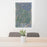 24x36 Big Sky Montana Map Print Portrait Orientation in Afternoon Style Behind 2 Chairs Table and Potted Plant