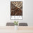 24x36 Big Sky Montana Map Print Portrait Orientation in Ember Style Behind 2 Chairs Table and Potted Plant