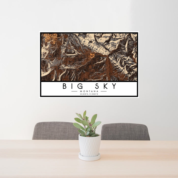 24x36 Big Sky Montana Map Print Landscape Orientation in Ember Style Behind 2 Chairs Table and Potted Plant