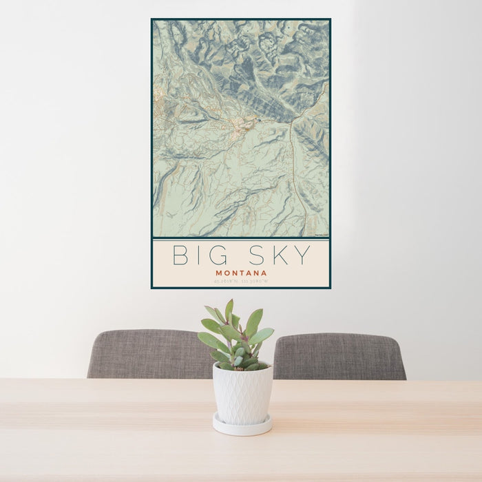 24x36 Big Sky Montana Map Print Portrait Orientation in Woodblock Style Behind 2 Chairs Table and Potted Plant