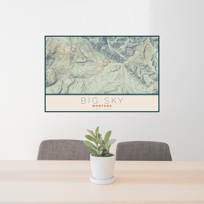 24x36 Big Sky Montana Map Print Landscape Orientation in Woodblock Style Behind 2 Chairs Table and Potted Plant