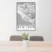 24x36 Big Sur California Map Print Portrait Orientation in Classic Style Behind 2 Chairs Table and Potted Plant