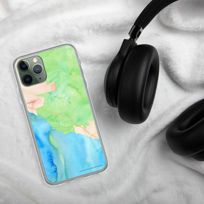 Custom Big Sur California Map Phone Case in Watercolor on Table with Black Headphones