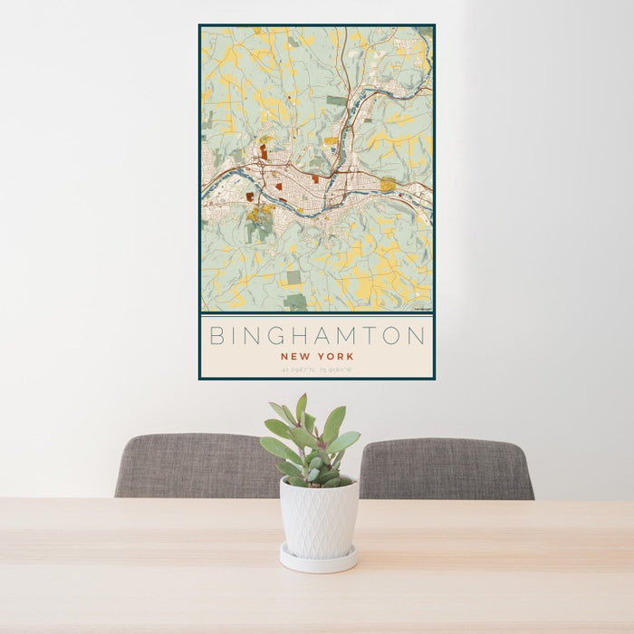 24x36 Binghamton New York Map Print Portrait Orientation in Woodblock Style Behind 2 Chairs Table and Potted Plant