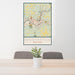 24x36 Binghamton New York Map Print Portrait Orientation in Woodblock Style Behind 2 Chairs Table and Potted Plant