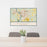 24x36 Bismarck North Dakota Map Print Landscape Orientation in Woodblock Style Behind 2 Chairs Table and Potted Plant