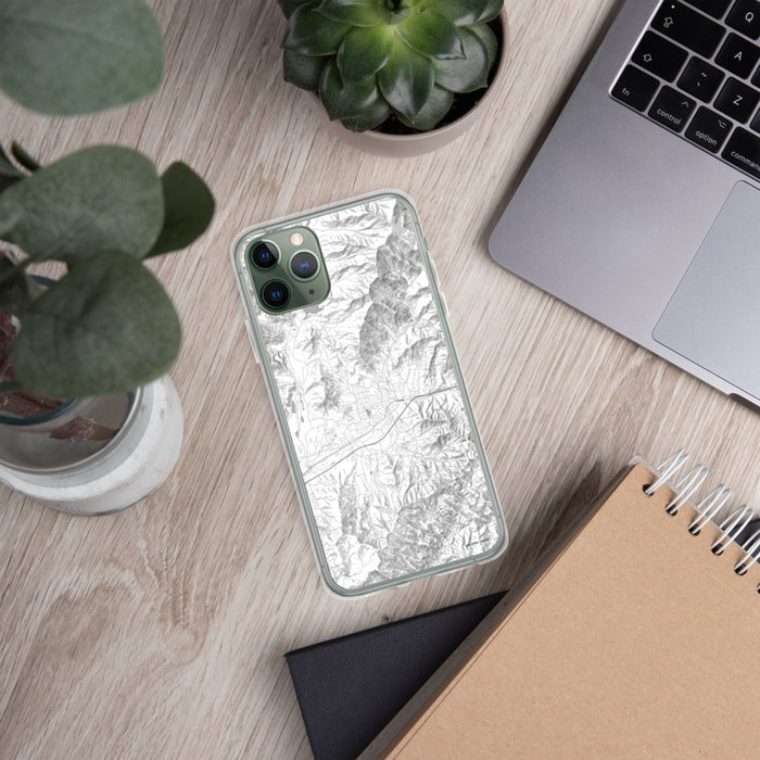 Custom Black Mountain North Carolina Map Phone Case in Classic on Table with Laptop and Plant