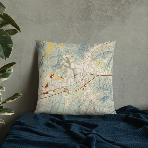 Custom Black Mountain North Carolina Map Throw Pillow in Woodblock on Bedding Against Wall