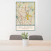 24x36 Blaine Minnesota Map Print Portrait Orientation in Woodblock Style Behind 2 Chairs Table and Potted Plant