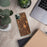 Custom Blaine Minnesota Map Phone Case in Ember on Table with Laptop and Plant