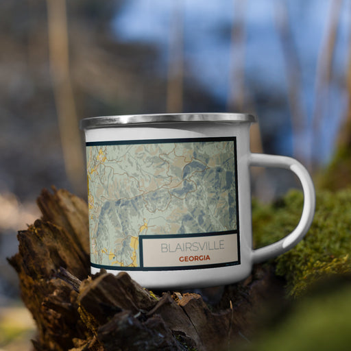 Right View Custom Blairsville Georgia Map Enamel Mug in Woodblock on Grass With Trees in Background