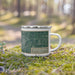 Right View Custom Bloomington Illinois Map Enamel Mug in Afternoon on Grass With Trees in Background