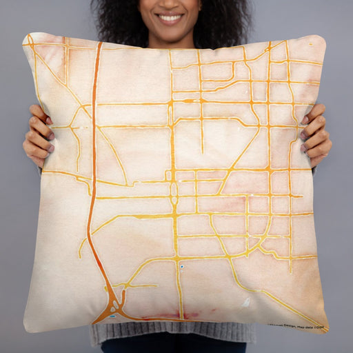 Person holding 22x22 Custom Bloomington Illinois Map Throw Pillow in Watercolor