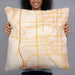 Person holding 22x22 Custom Bloomington Illinois Map Throw Pillow in Watercolor