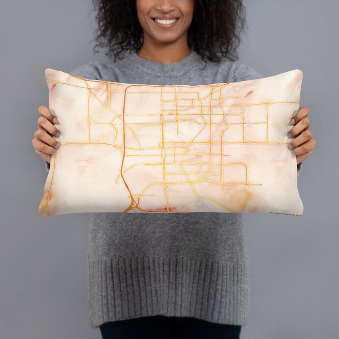 Person holding 20x12 Custom Bloomington Illinois Map Throw Pillow in Watercolor