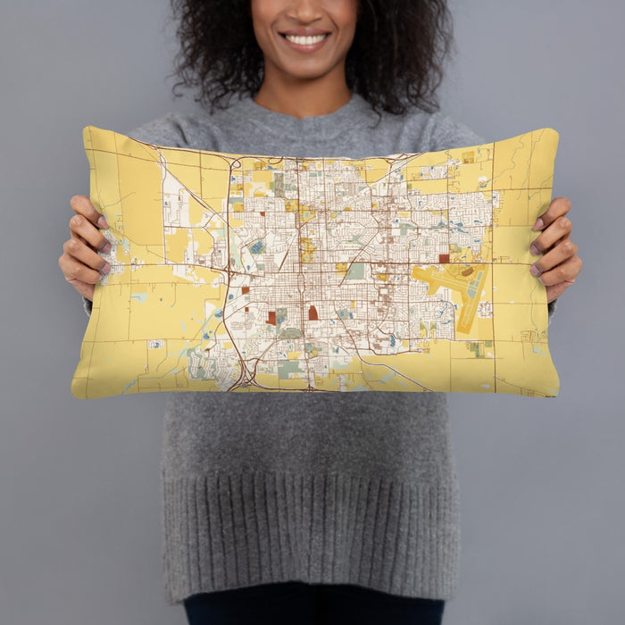 Person holding 20x12 Custom Bloomington Illinois Map Throw Pillow in Woodblock