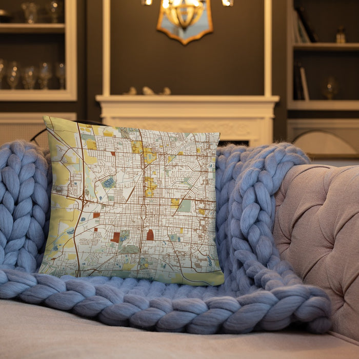 Custom Bloomington Illinois Map Throw Pillow in Woodblock on Cream Colored Couch