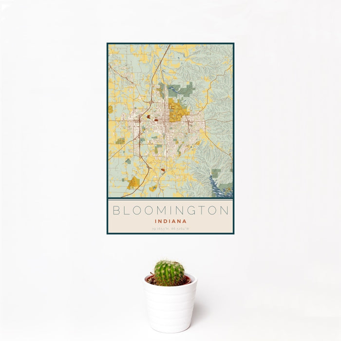 12x18 Bloomington Indiana Map Print Portrait Orientation in Woodblock Style With Small Cactus Plant in White Planter