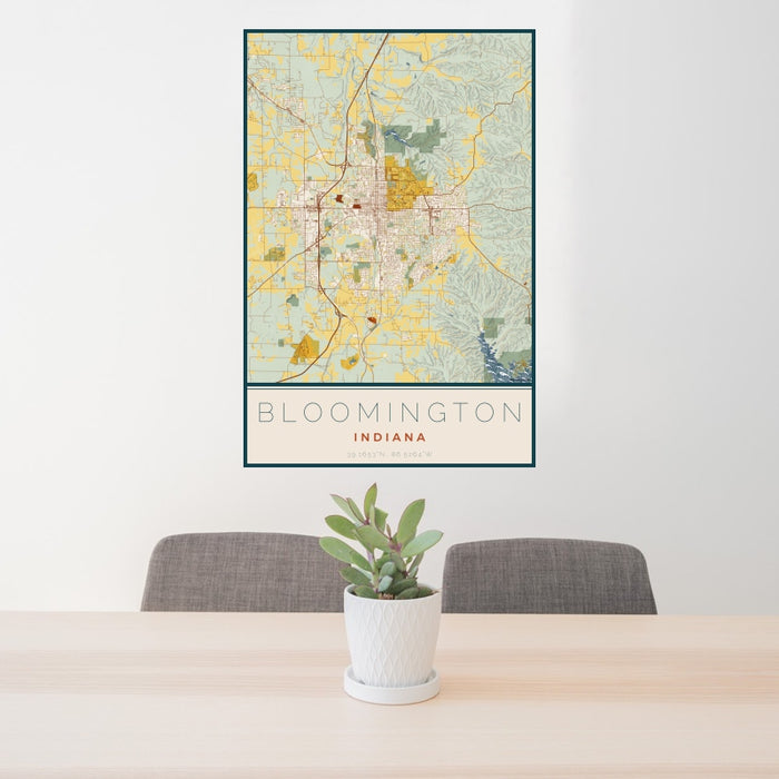 24x36 Bloomington Indiana Map Print Portrait Orientation in Woodblock Style Behind 2 Chairs Table and Potted Plant